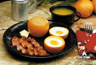 Oranges make great pans when camping or cooking outdoors.