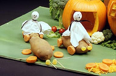 Create a spooky haunted house scene with other vegetables.