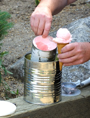 Dian Thomas pulling home made ice cream out of a tin can