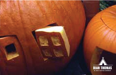 Carve a house in to pumpkins to make a scary pumpkin village.